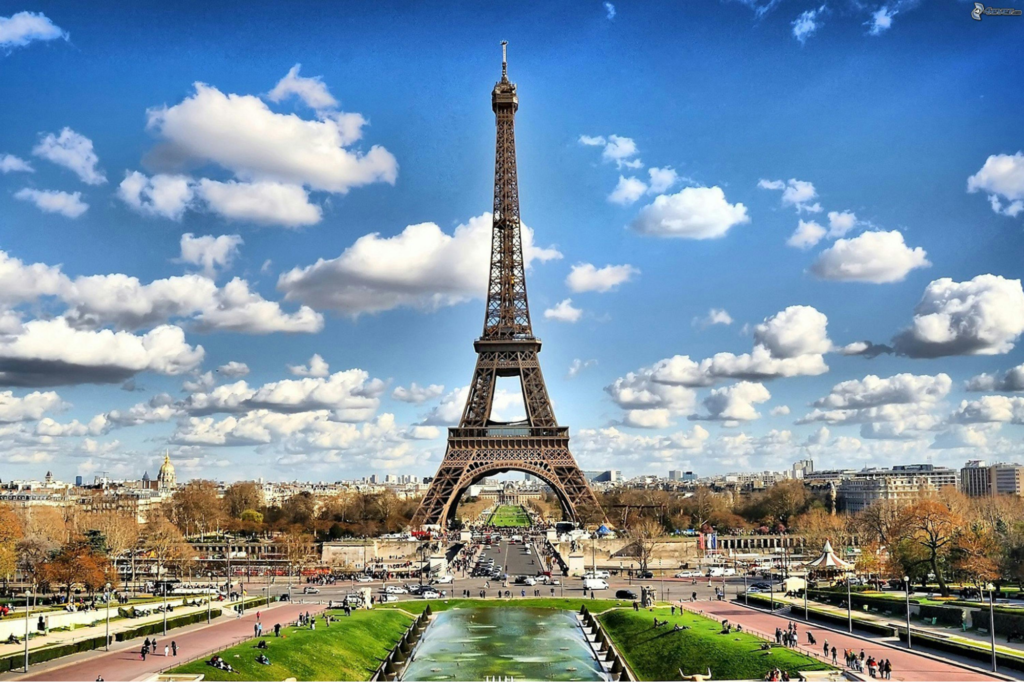 Image showcases the front view of the Eiffel Tower, Paris