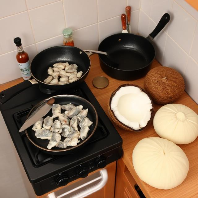 Simple cooking setup with tuna and coconut – making food in Maldives.